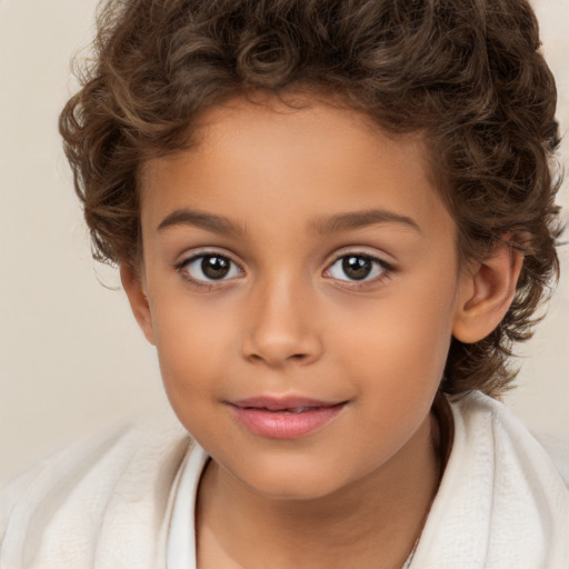 Joyful white child female with short  brown hair and brown eyes