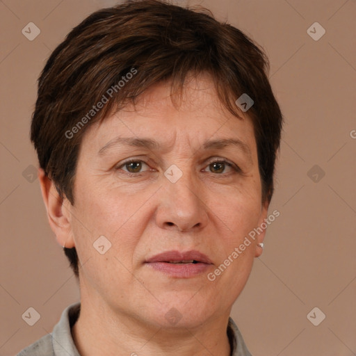 Joyful white adult female with short  brown hair and brown eyes