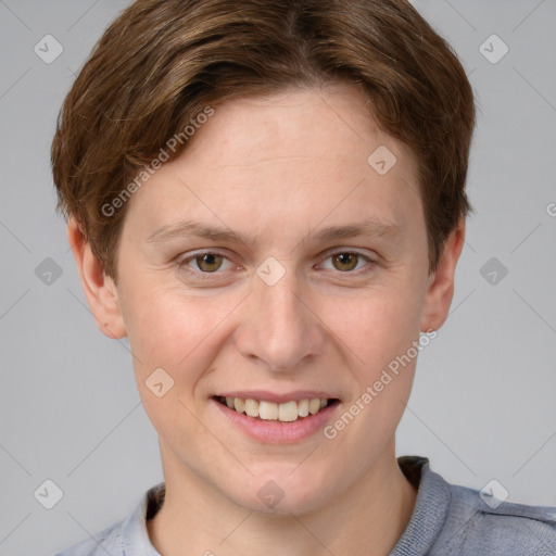 Joyful white young-adult female with short  brown hair and blue eyes