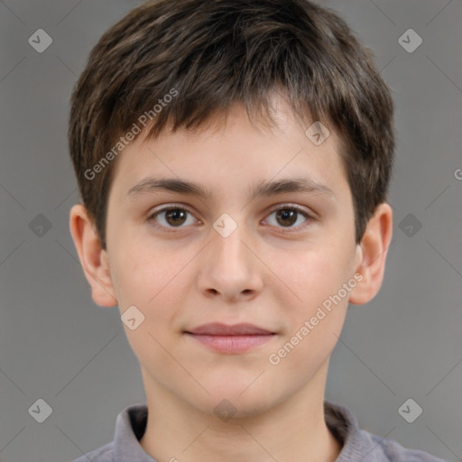 Joyful white child male with short  brown hair and brown eyes