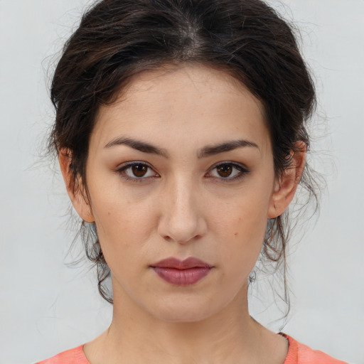Neutral white young-adult female with medium  brown hair and brown eyes