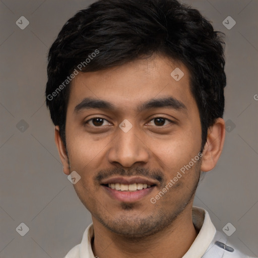 Joyful latino young-adult male with short  black hair and brown eyes