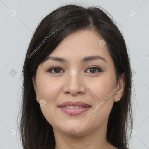 Joyful asian young-adult female with long  brown hair and brown eyes