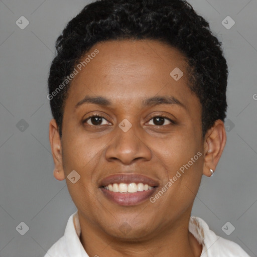 Joyful latino adult female with short  brown hair and brown eyes