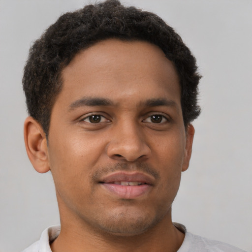 Neutral latino young-adult male with short  brown hair and brown eyes