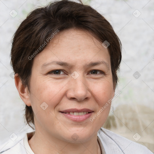 Joyful white adult female with short  brown hair and brown eyes