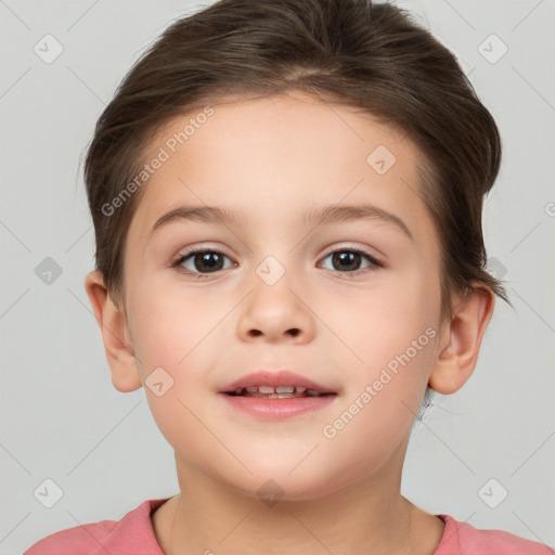 Joyful white child female with short  brown hair and brown eyes