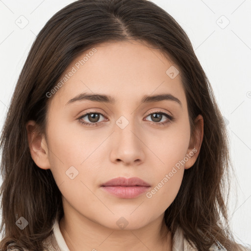 Neutral white young-adult female with long  brown hair and brown eyes