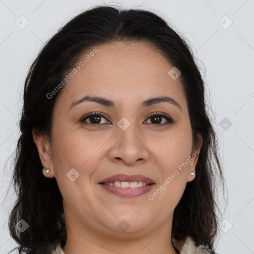 Joyful white adult female with long  brown hair and brown eyes