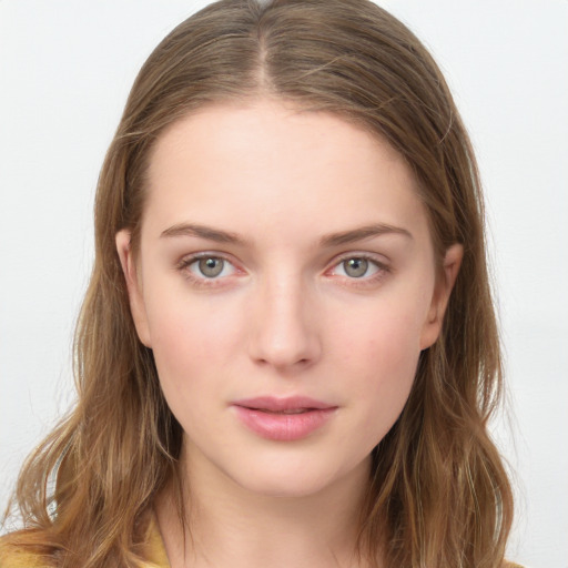 Neutral white young-adult female with long  brown hair and brown eyes