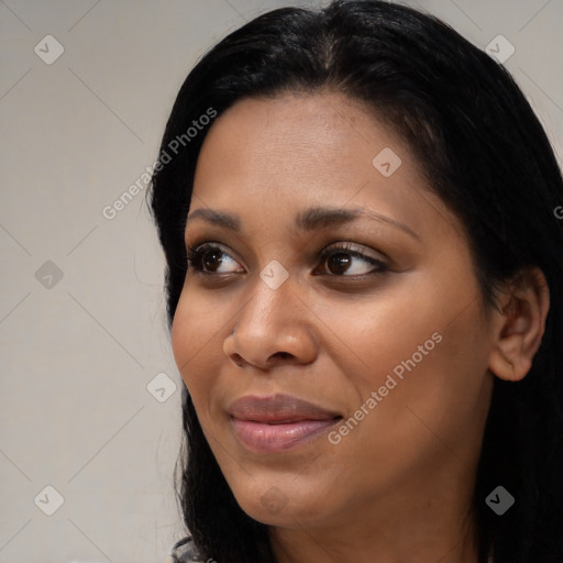 Joyful black young-adult female with medium  black hair and brown eyes