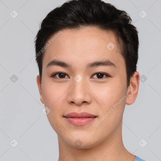 Joyful asian young-adult male with short  brown hair and brown eyes