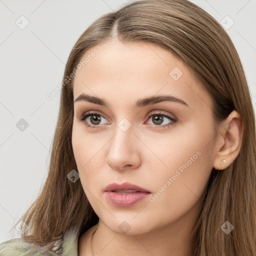 Neutral white young-adult female with long  brown hair and brown eyes