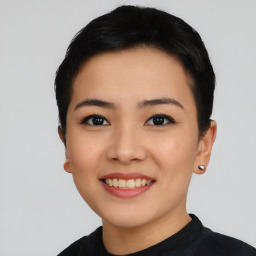 Joyful asian young-adult female with short  black hair and brown eyes