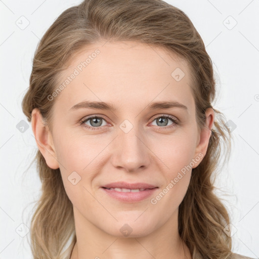 Joyful white young-adult female with medium  brown hair and blue eyes