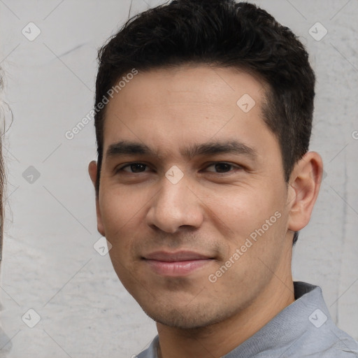 Joyful white young-adult male with short  black hair and brown eyes