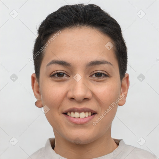 Joyful white young-adult female with short  brown hair and brown eyes