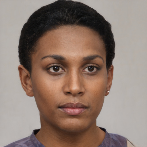 Neutral black young-adult female with short  black hair and brown eyes