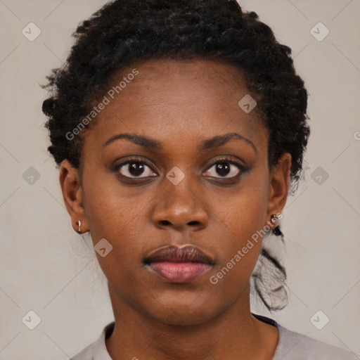 Neutral black young-adult female with short  brown hair and brown eyes