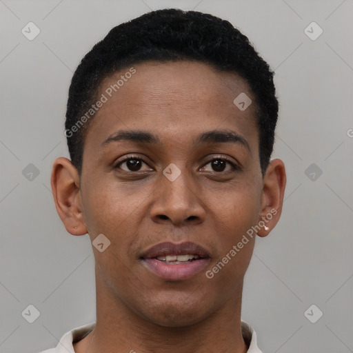 Joyful black young-adult male with short  brown hair and brown eyes