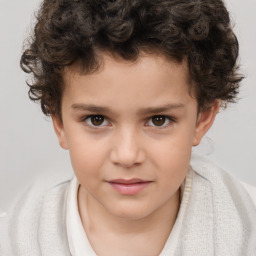 Joyful white child male with short  brown hair and brown eyes