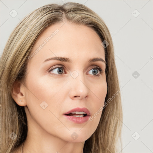 Neutral white young-adult female with long  brown hair and brown eyes