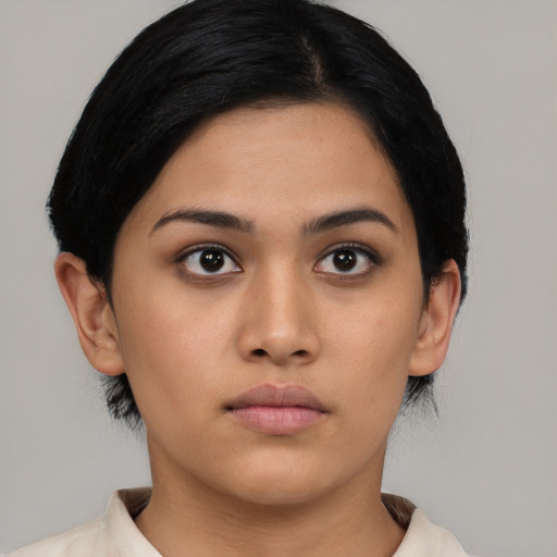 Neutral asian young-adult female with medium  black hair and brown eyes