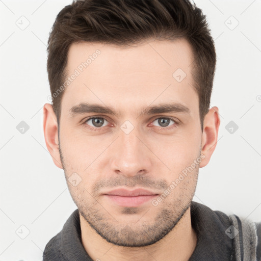 Neutral white young-adult male with short  brown hair and brown eyes