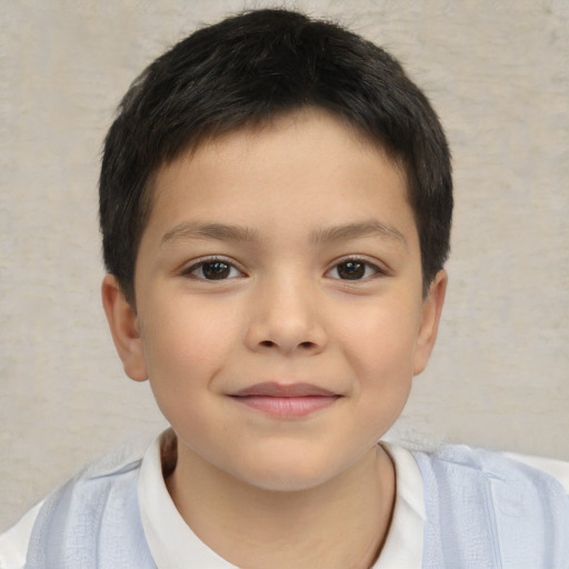 Joyful white child female with short  brown hair and brown eyes