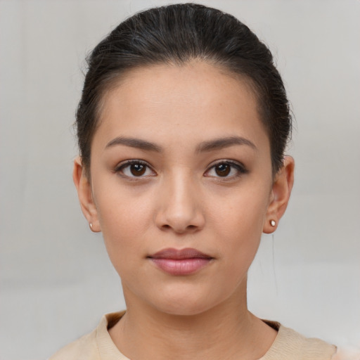 Neutral white young-adult female with short  brown hair and brown eyes