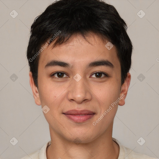 Joyful asian young-adult male with short  black hair and brown eyes