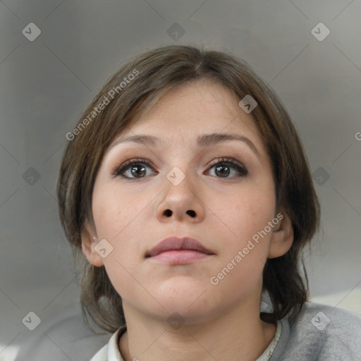 Neutral white young-adult female with medium  brown hair and brown eyes