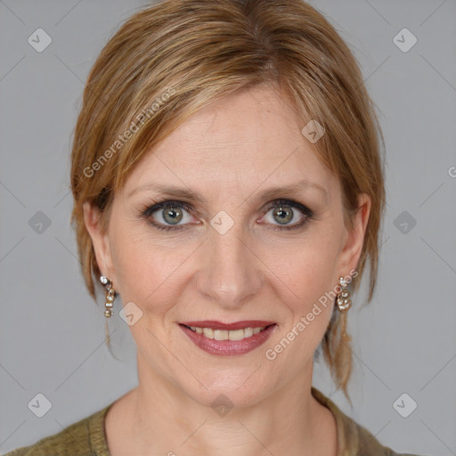 Joyful white young-adult female with medium  brown hair and blue eyes