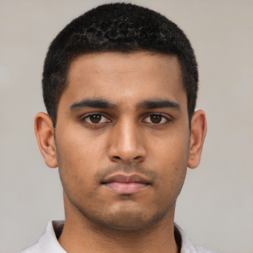 Neutral latino young-adult male with short  black hair and brown eyes