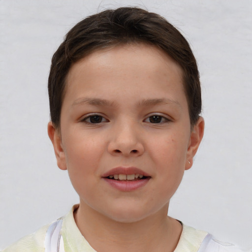 Joyful white child female with short  brown hair and brown eyes