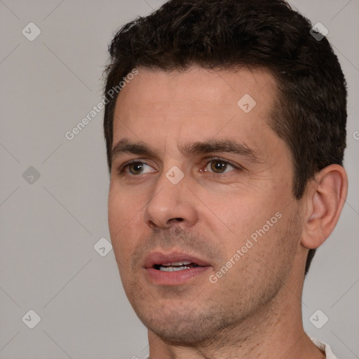 Neutral white adult male with short  brown hair and brown eyes