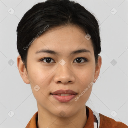 Joyful asian young-adult female with short  brown hair and brown eyes