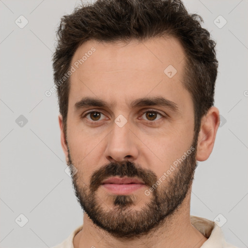 Neutral white young-adult male with short  brown hair and brown eyes