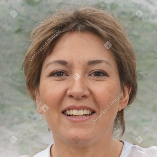 Joyful white adult female with short  brown hair and brown eyes