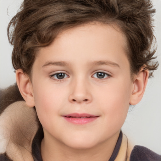 Joyful white child female with short  brown hair and brown eyes