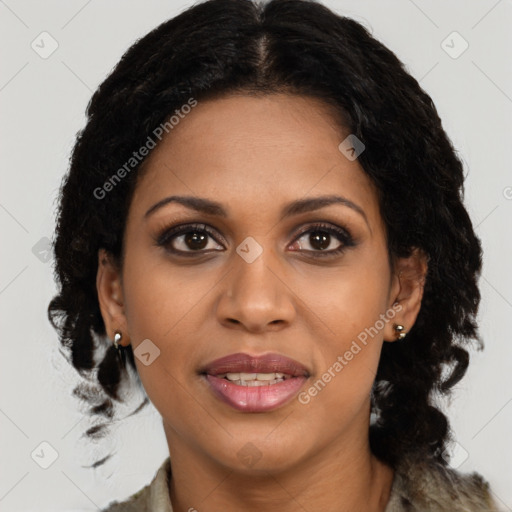 Joyful black young-adult female with long  brown hair and brown eyes