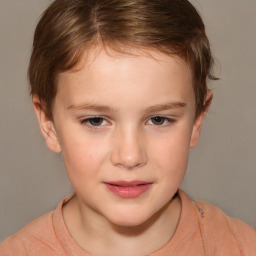 Joyful white child female with short  brown hair and brown eyes