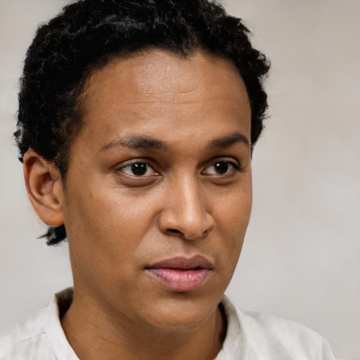 Neutral black young-adult female with short  brown hair and brown eyes