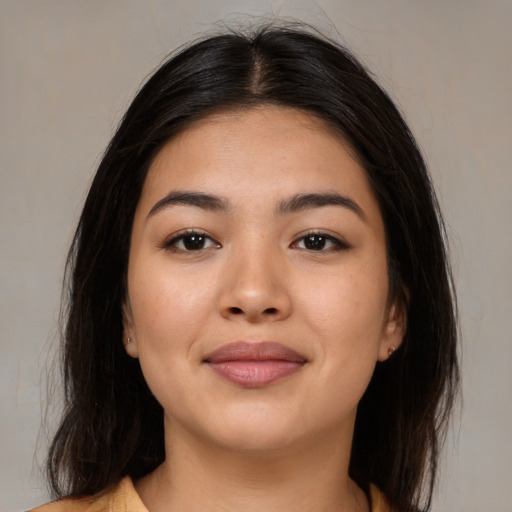 Joyful asian young-adult female with medium  brown hair and brown eyes