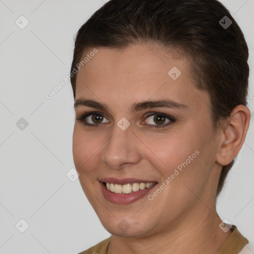 Joyful white young-adult female with short  brown hair and brown eyes