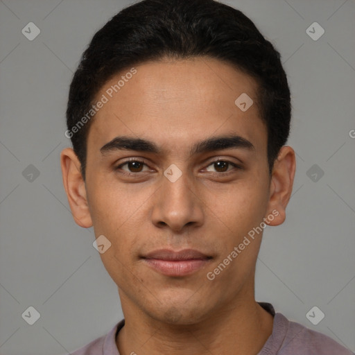 Joyful latino young-adult male with short  brown hair and brown eyes