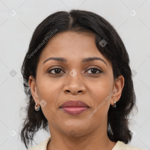 Joyful latino young-adult female with medium  brown hair and brown eyes