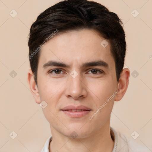 Joyful white young-adult male with short  brown hair and brown eyes