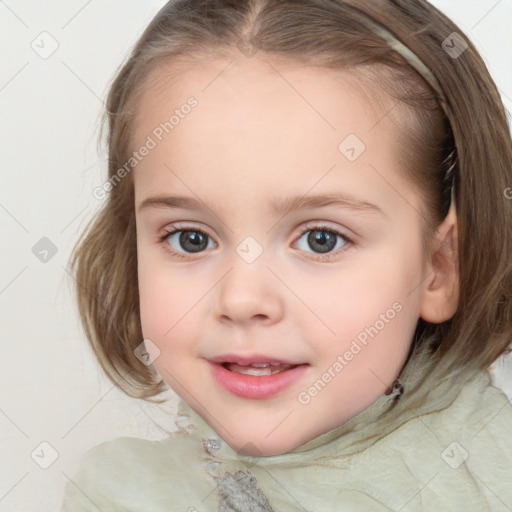 Joyful white child female with medium  brown hair and blue eyes