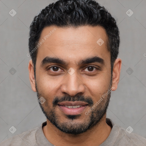 Joyful latino young-adult male with short  black hair and brown eyes